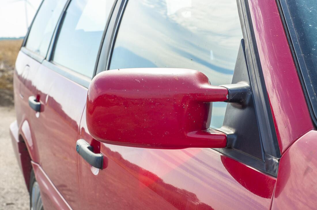 red car damaged windshield